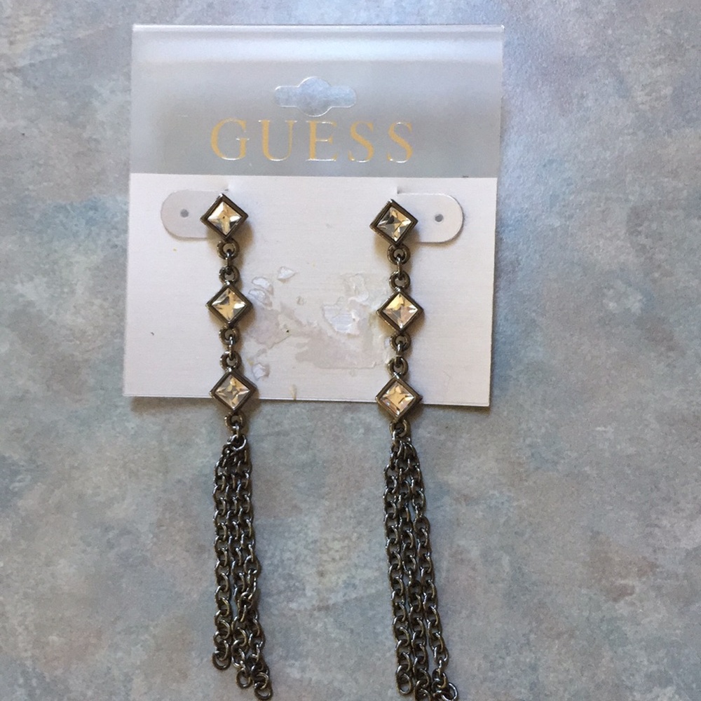 Guess earrings. Silver tone drop earrings